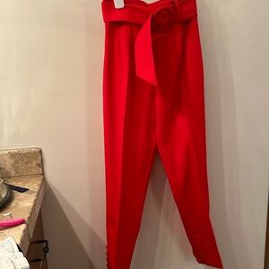 Chic red wool gabardine high waisted cigarette pants with wide matching belt